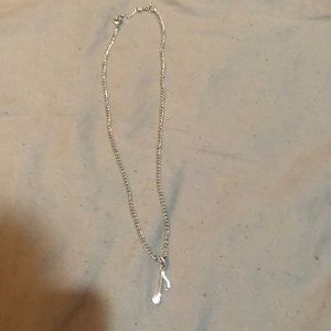 Treble clef necklace